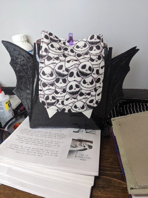 purse with bat wings and skeleton flap